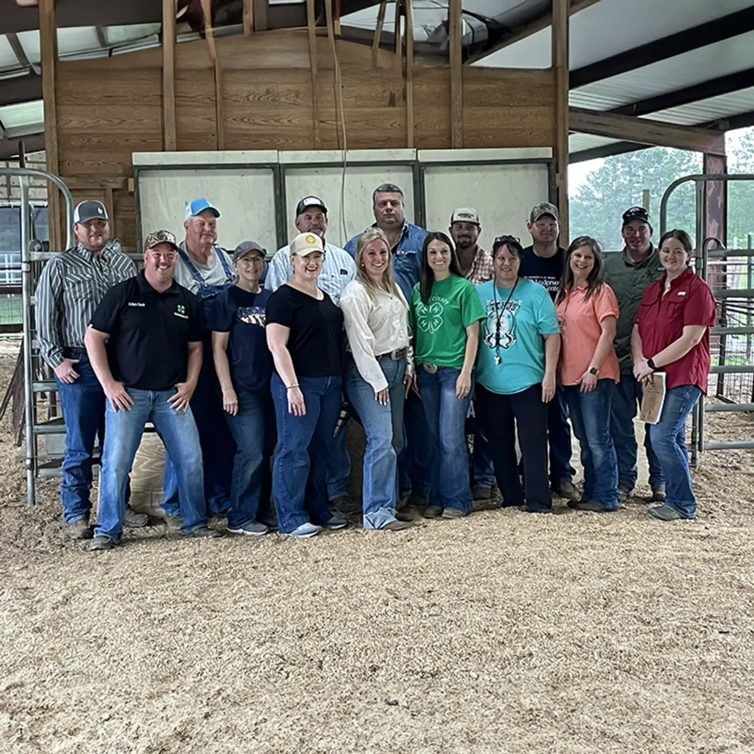 The Foundation's volunteer board and helpers standing together in the show barn